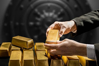 Gold rises on Iran war safe-haven bid; firm dollar limits upside